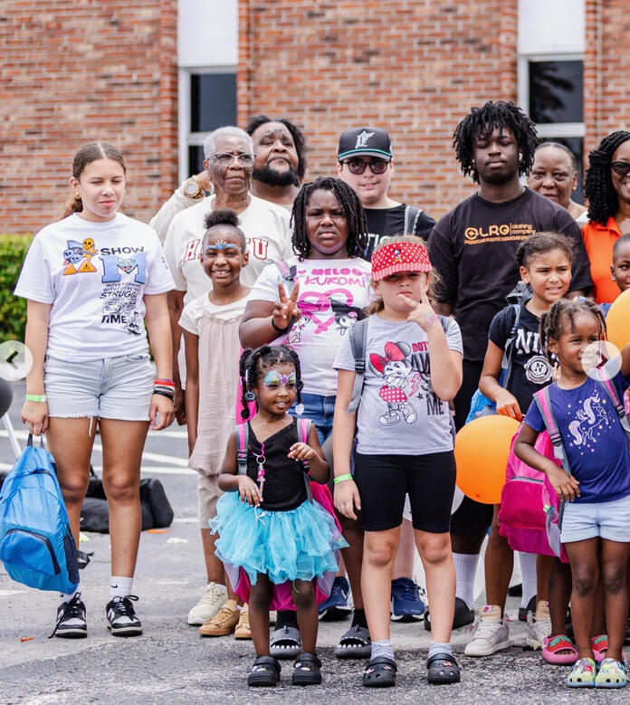 REAL AMERICANS CORPORATION sponsored 50 backpacks for FCAA First Annual FamilyFest