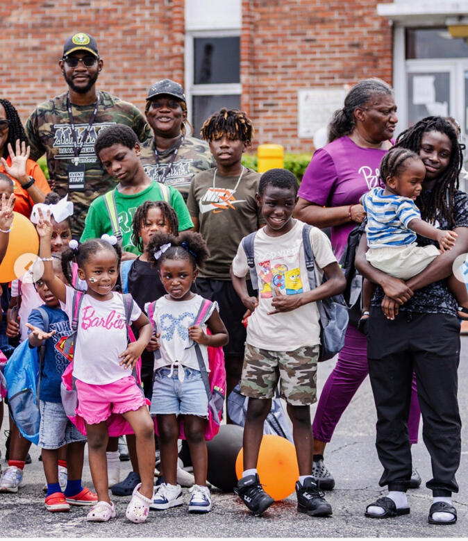 REAL AMERICANS CORPORATION sponsored 50 backpacks for FCAA First Annual FamilyFest